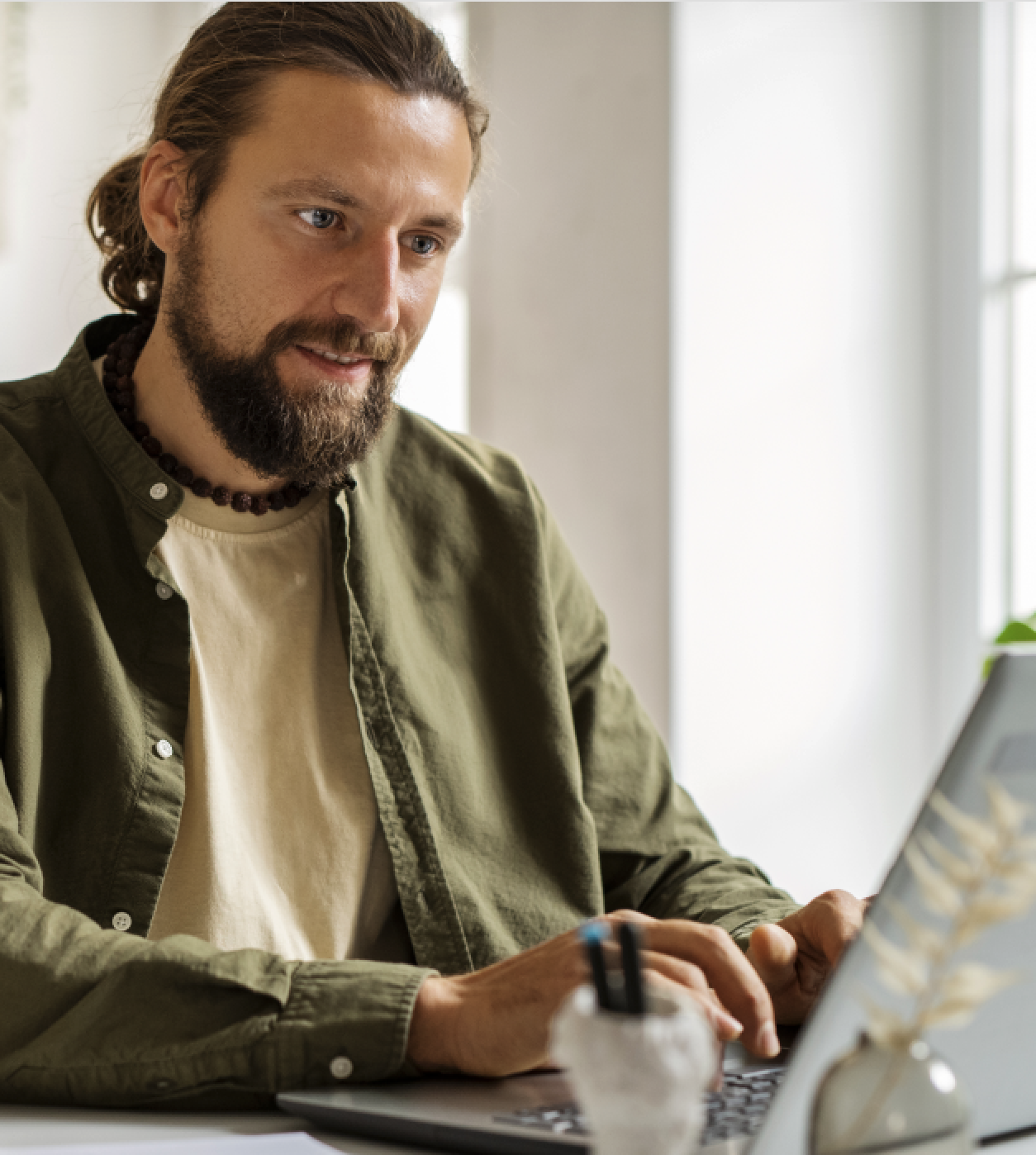 Man doing research on laptop
