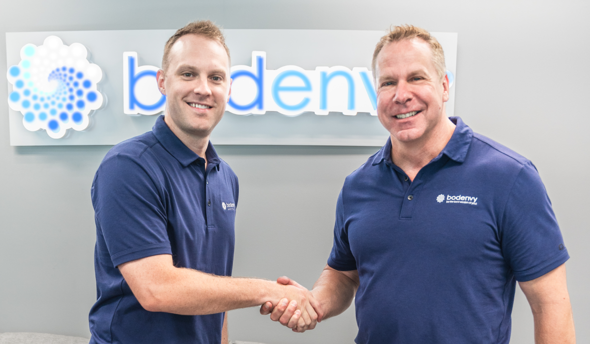 BodyEnvy employees shaking hands