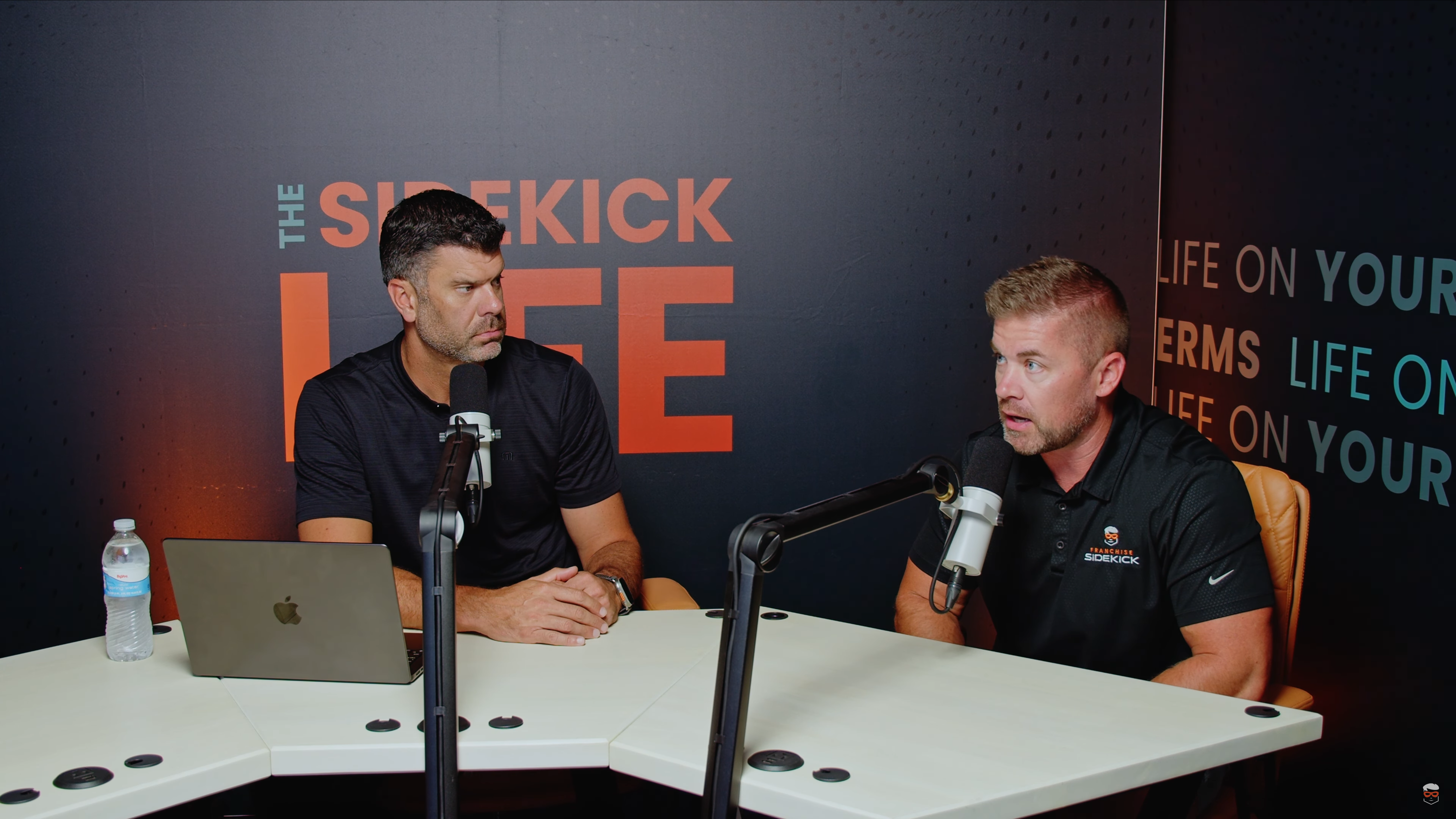A photo of Ryan Zink and Sidekick Advisor, Anthony Hudson, in the podcast studio